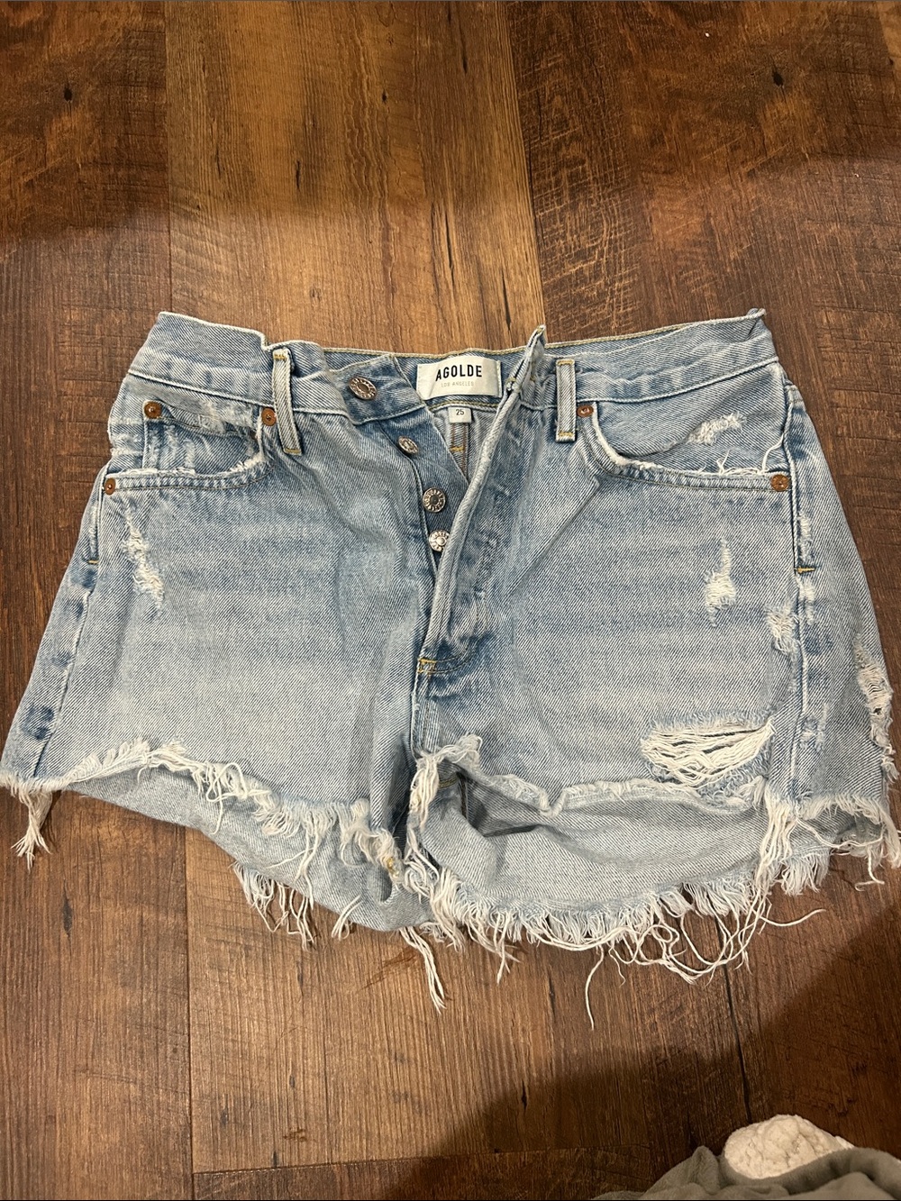 Agolde Washed Light Blue Distressed Denim Cutoff Shorts
